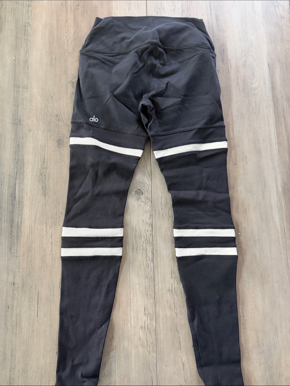 Alo Medium Ribbed Black Leggings with White Striped Knee Details - Picture 9 of 11